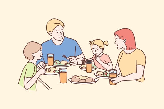 Family, meal, recreation, leisure, dinner, fatherhood, motherhood, childhood concept. Man dad woman mom children kids son daughter eating breakfast dinner lunch supper together. Fathers or mothers day