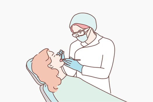 Health, care, medicine, dentistry concept. Young woman doctor dentist checking examinates teeth of patient in special chair. Routine dental checkup procedure or toothache oral treatment illustration.