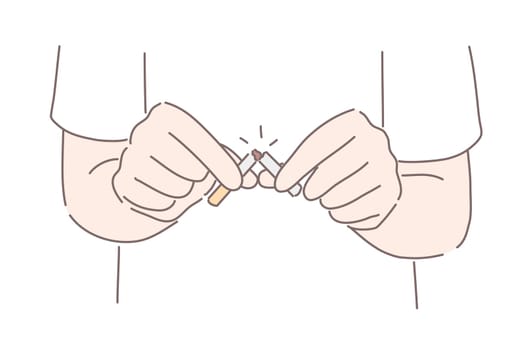 Stop smoking concept. Hands or man smoker holding and cutting cigarette to prevent smoking. Healthy lifestyle, bad habit, cancer, nicotine, addiction concept
