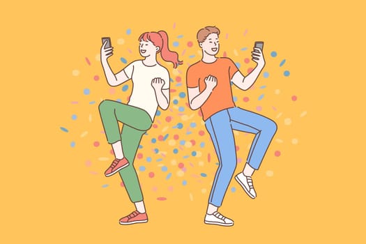 Emotional wow concept. Surprised young guy and girl blogger reading shocked news in message on mobile phone. Friends enjoy the good news in their smartphone.