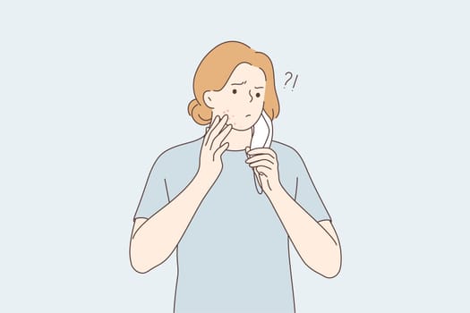 Skin problems, allergy from medical protective mask concept. Young frustrated teen boy cartoon character wearing medical face mask pointing at pimple on chin under mask illustration