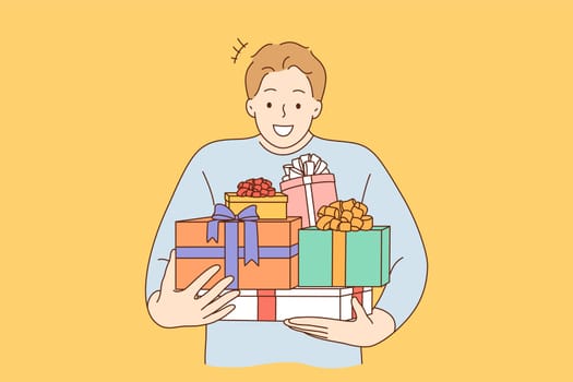 Holiday, gift, celebration concept. Young happy cheerful smiling excited man guy boy cartoon character holding carrying many presents. New year christmas or birthday gifts giveaway illustration.