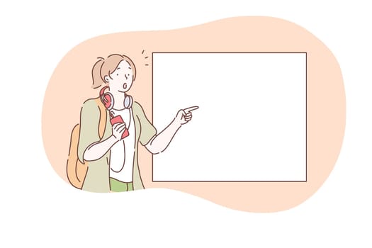 Demonstration, promotion, attention, advertisement concept. Young surprised frustrated girl cartoon character standing and pointing with finger at white blank placard with copy space for text