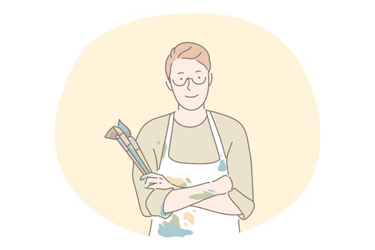 Artist, painter, artwork, drawing concept. Young man artist cartoon character standing in coloured apron and holding heap of painting brushes for making artwork or during workshop in art school