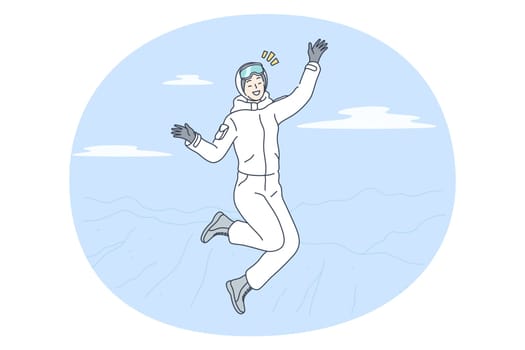 Winter activities, skiing, snowboarding concept. Young happy smiling woman cartoon character in white winter costume jumping feeling cheerful after riding downhill on ski or snowboard in mountaints
