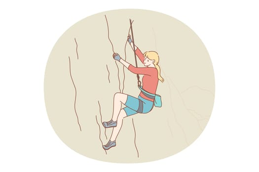 Alpinism and climbing concept. Young girl athlete climbing natural mountains with special equipment to reach peak in summer. Extreme sport and recreation outdoors
