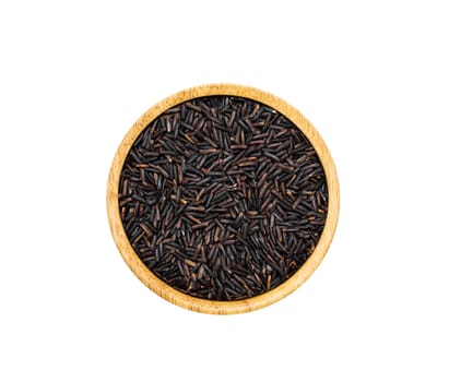 Whole grain Riceberry purple rice heap in wooden brown bowl isolated on white background, top view. Unpolished organic long grained rice with germ