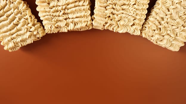 Instant noodles asian ramen. Dry yellow raw food noodles. pasta, for the preparation of which it is enough to pour boiling water and wait a few minutes. Copy space korean and japanese vermicelli