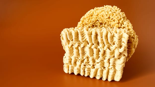 Instant noodles asian ramen. Dry yellow raw food noodles. pasta, for the preparation of which it is enough to pour boiling water and wait a few minutes. Copy space korean and japanese vermicelli
