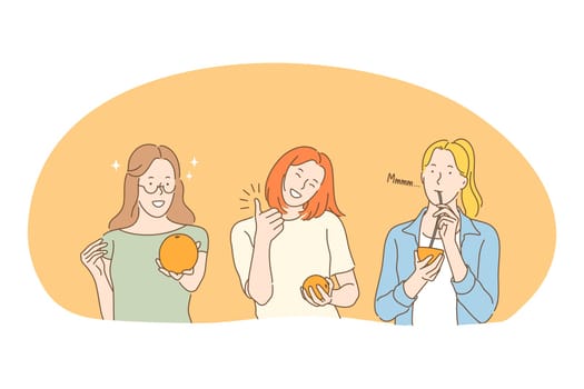 Healthy food, clean eating, vegetarian diet concept. Young positive woman eating fresh orange and drinking freshly squeezed orange juice from straw enjoying vegan diet. Wellness, healthy lifestyle