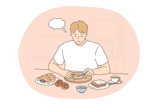 Healthy food, clean eating, nutrition concept. Young positive man cartoon thinking about benefits of healthy balanced breakfast at home with toasts and fruits. Wellness, bodycare