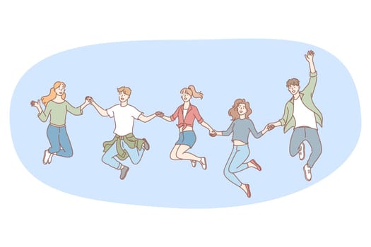 Friendship, happiness, fun concept. Group of smiling cheerful children friends holding hands and jumping together during walk or party celebration. Fun leisure recreation for teens children