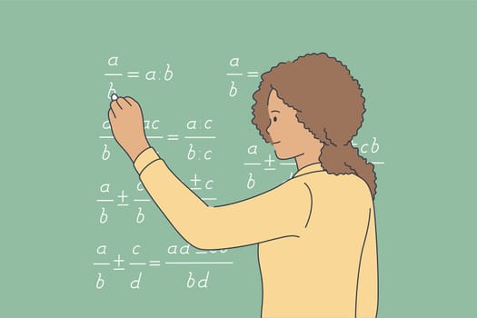 Education, school, study, solution, knowledge concept. Young pensive thoughtful african american schoolgirl child kid standing near blackboard and solving math equation with chalk. Educational process