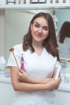Woman beautician doctor at work in spa center. Portrait of a young female professional cosmetologist. Healthcare occupation, medical career.