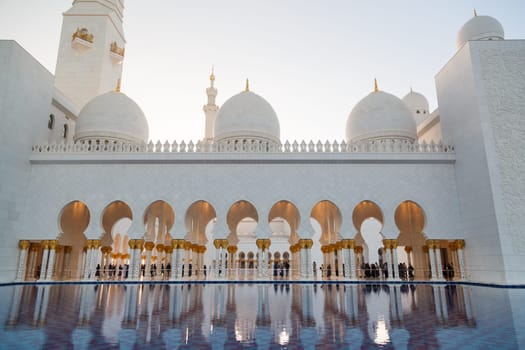 Grand Mosque in Abu Dhabi in the evening. Panorama of exterior of Sheikh Zayed Mosque
