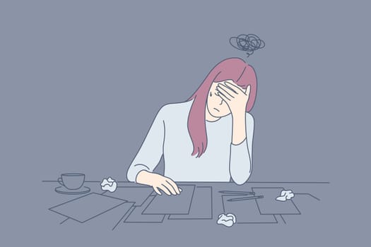 Creative crisis, fatigue, mental stress, depression, frustration concept. Young depressed frustrated upset woman or girl, writer artist has creative crisis. Fatigue, raising of mental stress, headache