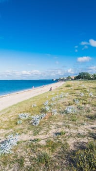 the beach of La Phibie on the island of Oléron, in France under a beautiful blue sky