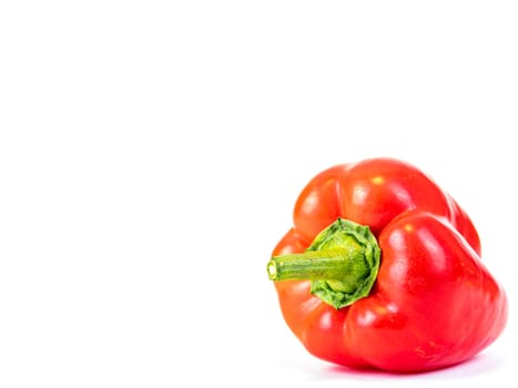 Fruit vegetable red bell pepper on a white background. Place for text. Template. Food photo. Showcase. Advertising. Background image.