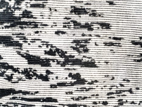 The texture of black and white velvet fabric. Background image. Place for text.