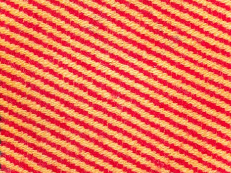 Texture of colored striped woolen fabric. Place for text. Background image.