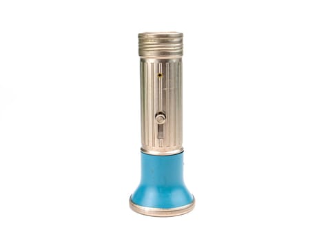 Pocket flashlight in a metal case on a white background. Retro. Technology. Place for text. Background image.