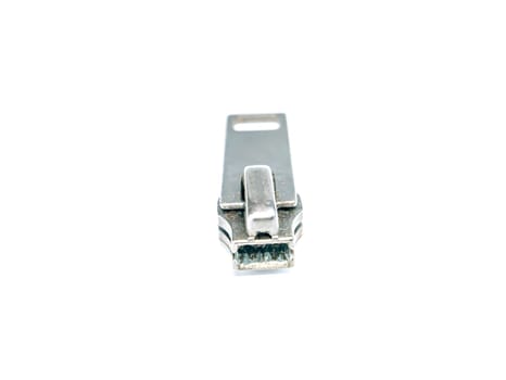 Zipper slider on a white background. Place for text. Free place. Macro photo.