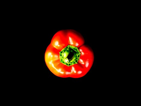 Vegetable red bell pepper on a black background. Food photo. Template for text. The menu of dishes. Place for text. Background image.