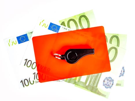 Warning cards and money of a football referee.. Corruption of a football referee for money. Money. Soccer referee cards. Sport. Tote. Bribe. Rates. Bribe. Place for text. Euro currency. Dollar.