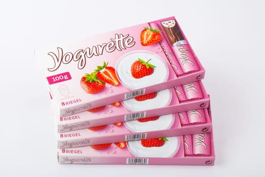 HUETTENBERG, GERMANY - 2021-07-24, Four Boxes of eight pieces of Yogurette, strawberry yogurt chocolate bars. Isolated on white background. Manufactured by Italian company Ferrero.