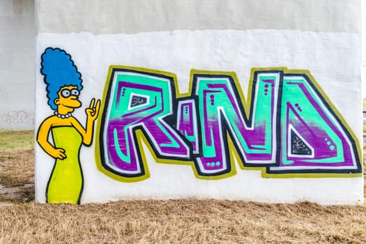 Leihgestern, Germany 2020-07-03: Marge Simpson painted on a wall. "Marge"" Simpson is a fictional lead character in the animated series The Simpsons."