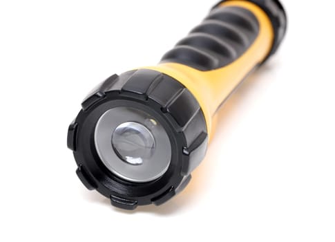 Electric led pocket flashlight isolated on white background