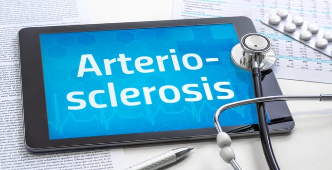 The word Arteriosclerosis on the display of a tablet