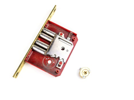 Door lock disassembled on a white background. Security. Security. Place for text. Technology.