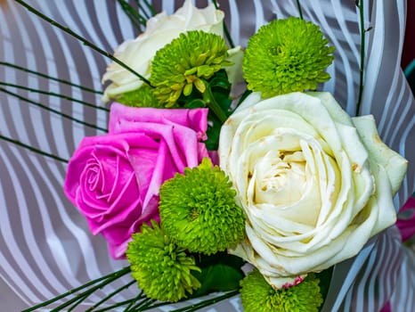 Festive bouquet of pink and white roses flowers. Birthday. Mothers Day. International Women's Day. Valentine's Day. Wedding. Holiday. Place for text. Background image.