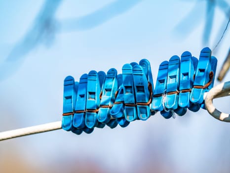 Clothespins for laundry on a clothesline. Background image. Place for text. Home life.