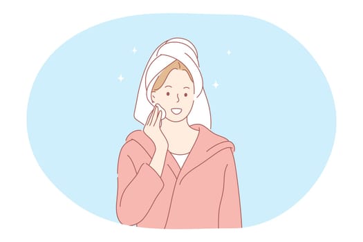 Cosmetics, make up, beauty concept. Young smiling woman cartoon character in towel cleaning face with lotion and cotton pad before going to bed or in morning. Skincare treatment illustration