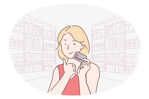 Credit card, paying, shopping, online banking, purchase, buying, customer concept. Young smiling woman cartoon character holding credit card in hands and showing thumbs up during shopping alone
