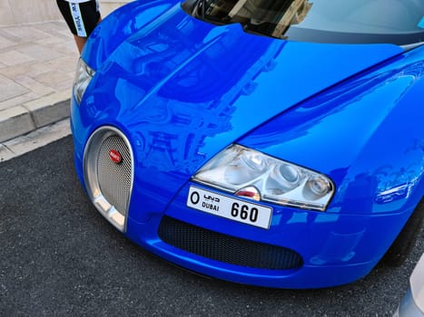 Monte-Carlo, Monaco - August 1, 2021: Blue Bugatti Veyron 16.4 Luxury Supercar Parked In Front Of The Monte-Carlo Casino In Monaco On The French Riviera, Europe. Closeup Front View .