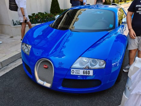 Monte-Carlo, Monaco - August 1, 2021: Blue Bugatti Veyron 16.4 Luxury Supercar Parked In Front Of The Monte-Carlo Casino In Monaco On The French Riviera, Europe. Closeup Front View .