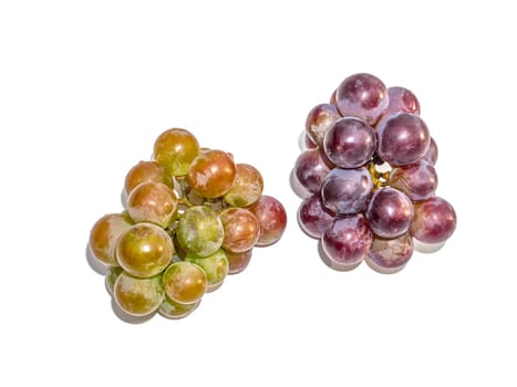 Harvest grapes berries on a white background. Grape juice. Winemaking. Wine production. Fruit shop showcase. Grape gardening. Agriculture. Place for text. Dried fruits. Garden fruits.