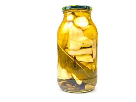 Canned vegetable marrow in a glass jar. Marinated squash vegetables. Harvest conservation for the winter. Marinate in a glass jar. Recipe. Home kitchen. Menu. Salting food. Cooking food.