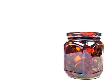 Canned fruits and vegetables in glass jars. Apple jam. Pickled vegetables. Harvest conservation for the winter. Marinate in a glass jar. Recipe. Home kitchen. Menu. Salting food. Food preparation.