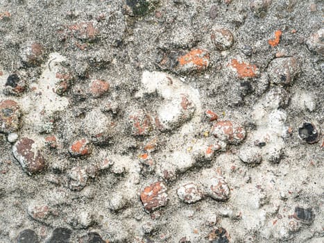 The texture of the surface of the concrete wall with a print. The background image of the site page. Template with place for text. Poster. Advertising.