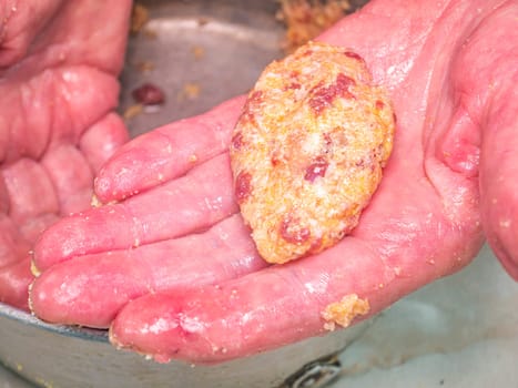 Raw meat cutlet in the hands of the cook. Food photo. Meat dish. Preparing food. Home kitchen. Recipe. Raw minced meat. Chicken's meat. Cutlets. Cook. Human hands. Advertising photo.