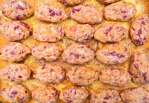 Raw meat cutlets on a wooden cutting board. Food photo. Meat dish. Preparing food. Home kitchen. Recipe. Raw minced meat. Chicken's meat. Cutlets. Cook. Advertising photo of the shop window ..