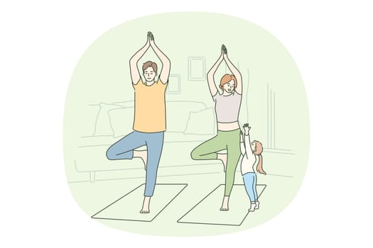 Healthy active lifestyle, training at home concept. Active young happy couple family with child doing workout practicing yoga on fitness mats at home during quarantine and enjoying time together