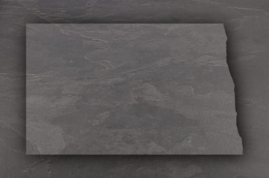 Map of North Dakota on dark slate