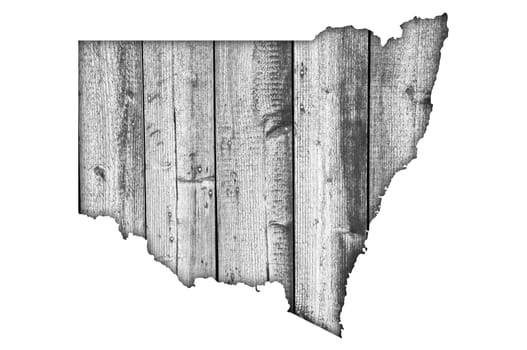 Map of New South Wales on weathered wood