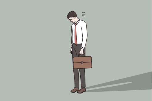 Failure, problems in business concept. Young Sad businessman standing looking down feeling lonely and having mental pressure or stress vector illustration