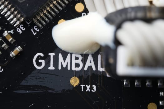 Super macro close up of gimbal area on an electronic drone circuit board. Modern technology and components, these drive a camera stabilization device.